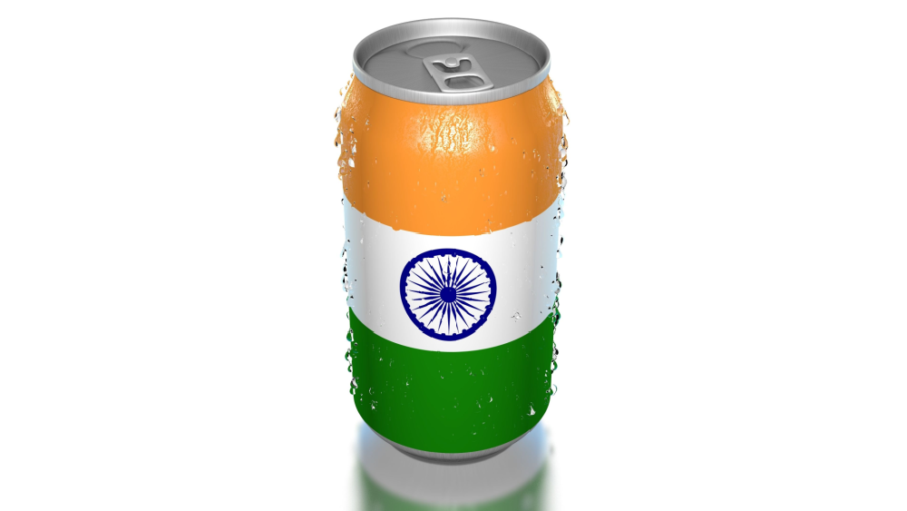 Soda can with indian flag shrink sleeve label