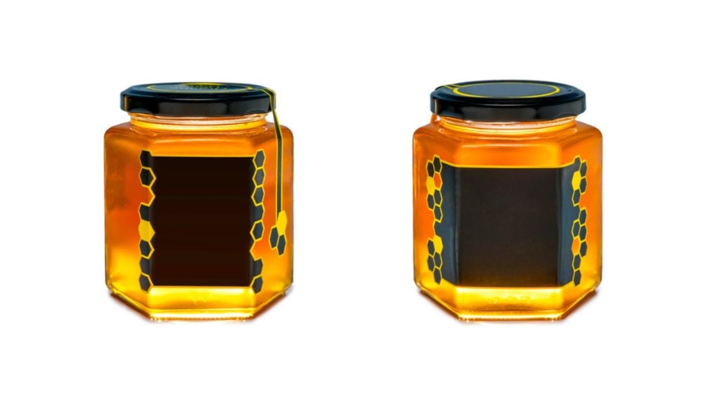 Black labels on honey jars