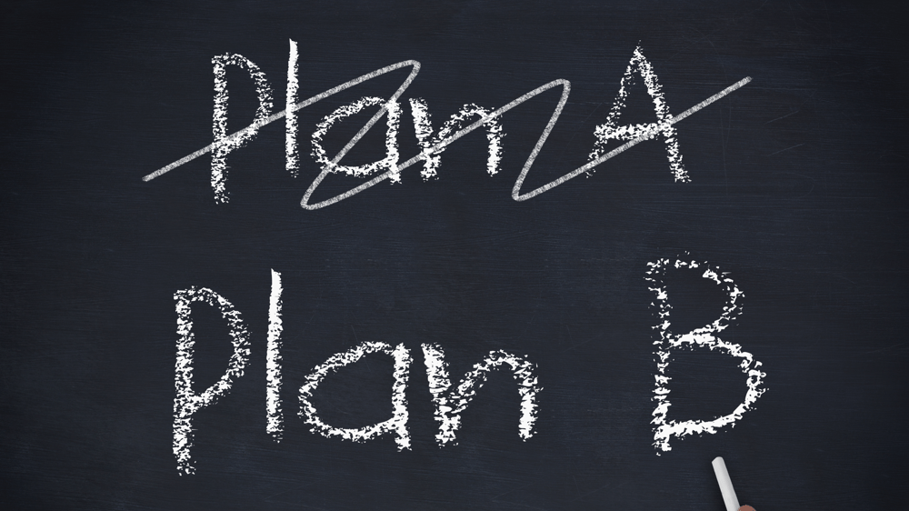 A chalk board with Plan A crossed out and Plan B underneath